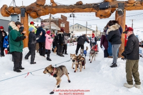 Aliy Zirkle crosses under the burl arch finish line in Nome to a 4th place finish of the 2019 Iditarod on Wednesday March 13Photo by Jeff Schultz/  (C) 2019  ALL RIGHTS RESERVED
