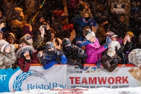 The crowd is excited to see Pete Kaiser cross the Nome finish line to win the 2019 Iditarod Trail Sled Dog Race. Pete's winning time is 9 days 12 hours 39 minutes and 6 secondsPhoto by Jeff Schultz/  (C) 2019  ALL RIGHTS RESERVED