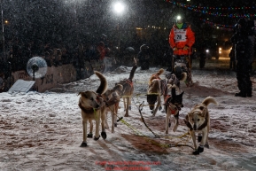 Joar Leifseth Ulsom runs up the finish chute to place second during  the 2019 Iditarod Trail Sled Dog Race. Photo by Jeff Schultz/  (C) 2019  ALL RIGHTS RESERVED