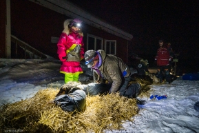 Veteran musher Dee Dee Jonrowe talks with Jessie Royer as she attends her dogs on March 13, 2020 after being the first musher into Ruby.