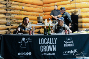 Jessie Holmes wins First Musher to the Yukon Award and shares his gourmet dinner with Ruby local Billy Honea.