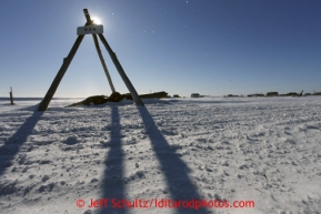 Tripod mile marker 934 casts its shadow a few miles from Nome during the Iditarod Sled Dog Race 2013Photo by Jeff Schultz copyright 2013 DO NOT REPRODUCE WITHOUT PERMISSION