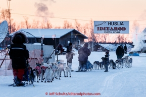 Lev Shvarts and Marcelle Fressineau arrive together at the Huslia checkpoint on Saturday  March 14, 2015 during Iditarod 2015.  (C) Jeff Schultz/SchultzPhoto.com - ALL RIGHTS RESERVED DUPLICATION  PROHIBITED  WITHOUT  PERMISSION