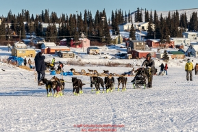 Brent Sass leaving the White Mountain checkpoint on Monday March 14th during the 2016 Iditarod.  Alaska    Photo by Jeff Schultz (C) 2016  ALL RIGHTS RESERVED