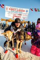 Dallas Seavey poses at the finish line in Nome with his lead dogs after finishing in 2nd place during the 2017 Iditarod on Tuesday eveing March 14, 2017.Photo by Jeff Schultz/SchultzPhoto.com  (C) 2017  ALL RIGHTS RESERVED