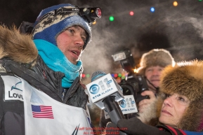 Joar Leifseth Ulsom talks with reporters at the finish line in Nome, Alaska early on Wednesday morning March 14th as he wins the 46th running of the 2018 Iditarod Sled Dog Race.  He finished in 9 days 12 hours 00 minutes and 00 secondsPhoto by Jeff Schultz/SchultzPhoto.com  (C) 2018  ALL RIGHTS RESERVED