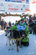 Iditarod Champion Ryan Redington with his Lead Dogs 4 - 2023 Nome