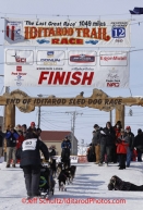 Thursday March 15, 2012  Rick Swenson runs into the finish chute as he completes his 36th Iditarod.  Iditarod 2012.