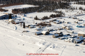A team arrives off the Yukon River into the Nulato checkpoint on the afternoon of Sunday  March 15, 2015 during Iditarod 2015.  (C) Jeff Schultz/SchultzPhoto.com - ALL RIGHTS RESERVED DUPLICATION  PROHIBITED  WITHOUT  PERMISSION