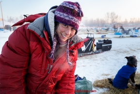 Laura Allaway is packing up at the Huslia checkpoint on the morning of Sunday  March 15, 2015 during Iditarod 2015.  (C) Jeff Schultz/SchultzPhoto.com - ALL RIGHTS RESERVED DUPLICATION  PROHIBITED  WITHOUT  PERMISSION