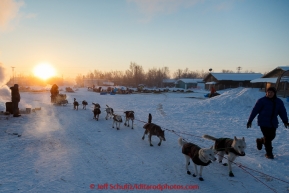 A dog team leaves at sunrise from the Huslia checkpoint on the morning of Sunday  March 15, 2015 during Iditarod 2015.  (C) Jeff Schultz/SchultzPhoto.com - ALL RIGHTS RESERVED DUPLICATION  PROHIBITED  WITHOUT  PERMISSION