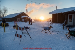 Jim Lanier leaving the Huslia checkpoint on the morning of Sunday  March 15, 2015 during Iditarod 2015.  (C) Jeff Schultz/SchultzPhoto.com - ALL RIGHTS RESERVED DUPLICATION  PROHIBITED  WITHOUT  PERMISSION