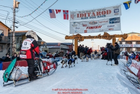 Aliy Zirkle arrives at the finish line in Nome for a third place finish on Tuesday March 15th during the 2016 Iditarod.  Alaska    Photo by Jeff Schultz (C) 2016  ALL RIGHTS RESERVED
