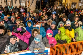 A crowd is on hand to watch Dallas Seavey win the 44th running of the Iditarod Sled Dog Race in Nome on Tuesday March 15th during the 2016 Iditarod in record time of 8 Days 11 hours 20 minutes 16 seconds     Photo by Jeff Schultz (C) 2016  ALL RIGHTS RESERVED
