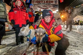 Mitch Seavey poses with his lead dogs after arriving in second place at the finish line in Nome on Tuesday March 15th during the 2016 Iditarod.  Alaska    Photo by Jeff Schultz (C) 2016  ALL RIGHTS RESERVED
