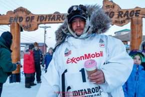Ray Redington Jr. poses at the finish line in Nome after finishing in 7th place during the 2017 Iditarod on Wednesday March 15, 2017.Photo by Jeff Schultz/SchultzPhoto.com  (C) 2017  ALL RIGHTS RESERVED
