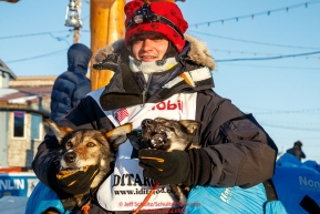 Robert Redington poses with his lead dogs at the finish line in Nome during the 2017 Iditarod on Wednesday March 15, 2017.Photo by Jeff Schultz/SchultzPhoto.com  (C) 2017  ALL RIGHTS RESERVED