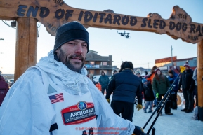 Sebastien Vergnaud at the finish line in Nome during the 2017 Iditarod on Wednesday March 15, 2017.Photo by Jeff Schultz/SchultzPhoto.com  (C) 2017  ALL RIGHTS RESERVED