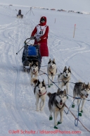 Lisbet Norris followed closely by Marcelle Fressineau on the trail a few miles from the Nome finish line on her way to Nome on Saturday March 15 during the 2014 Iditarod Sled Dog Race.PHOTO (c) BY JEFF SCHULTZ/IditarodPhotos.com -- REPRODUCTION PROHIBITED WITHOUT PERMISSION