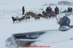 Richie Diehl pulls out of the holding area on the slough ice in the evening at the Unalakleet checkpoint on Monday March 16, 2015 during Iditarod 2015.  (C) Jeff Schultz/SchultzPhoto.com - ALL RIGHTS RESERVED DUPLICATION  PROHIBITED  WITHOUT  PERMISSION