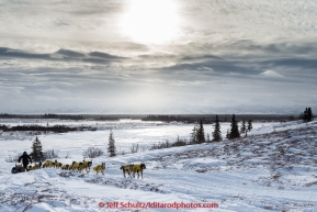 Mats Pettersson of Swedend on the trail in 30 mph wind several miles before the Unalakleet checkpoint on Monday March 16, 2015 during Iditarod 2015.  (C) Jeff Schultz/SchultzPhoto.com - ALL RIGHTS RESERVED DUPLICATION  PROHIBITED  WITHOUT  PERMISSION