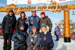 The drug testing team (AKA P-Team) poses for a group photo at the finish line in Nome during the 2017 Iditarod on Thursday March 16, 2017.Photo by Jeff Schultz/SchultzPhoto.com  (C) 2017  ALL RIGHTS RESERVED