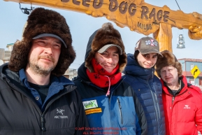 The three  Redington Brothers, Ryan, Robert and Ray Jr.  and their dad Raymie pose at the finish line in Nome during the 2017 Iditarod on Thursday March 16, 2017.Photo by Jeff Schultz/SchultzPhoto.com  (C) 2017  ALL RIGHTS RESERVED