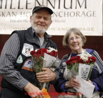 Musher Dan Seavey and assistant race director Joanne Potts pose for being nominated into the Anchorage Daily News Iditarod Hall of Fame at the musher awards banquet in Nome on Sunday March 17, 2013.  Iditarod Sled Dog Race 2013Photo by Jeff Schultz copyright 2013 DO NOT REPRODUCE WITHOUT PERMISSION