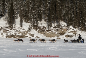Dallas Seavey runs down the Fish River shorlty after leaving the White Mountain checkpoint on Tuesday March 16, 2015 during Iditarod 2015.  (C) Jeff Schultz/SchultzPhoto.com - ALL RIGHTS RESERVED DUPLICATION  PROHIBITED  WITHOUT  PERMISSION