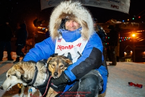 Geir Idar Hjelvik poses with his lead dogs at the finish line in Nome arriving in 45th place during the 2017 Iditarod on Friday March 17, 2017.Photo by Jeff Schultz/SchultzPhoto.com  (C) 2017  ALL RIGHTS RESERVED
