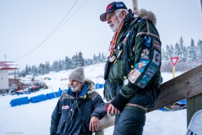 Veterinarians Bill Sampson and George Stroberg during an unusual break in the action at Koyuk on March 17, 2020.