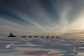 Ken Anderson on the trail several miles from the Nome finish line near sunset on Wednesday March 18, 2015 during Iditarod 2015.  (C) Jeff Schultz/SchultzPhoto.com - ALL RIGHTS RESERVED DUPLICATION  PROHIBITED  WITHOUT  PERMISSION