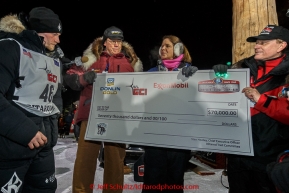 Dallas Seavey recieves his $70,000 first-place check after winning his 3rd Iditarod in 8 days 18 hours 13 minutes 6 seconds on Wednesday March 18, 2015 during Iditarod 2015.  (C) Jeff Schultz/SchultzPhoto.com - ALL RIGHTS RESERVED DUPLICATION  PROHIBITED  WITHOUT  PERMISSION