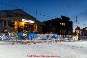 Mitch Seavey crosses the Nome finish line in second place on Wednesday March 18, 2015 during Iditarod 2015.  (C) Jeff Schultz/SchultzPhoto.com - ALL RIGHTS RESERVED DUPLICATION  PROHIBITED  WITHOUT  PERMISSION