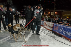 Dallas Seavey walks his lead dogs Reef and Hero in front of the crowd after winning his 3rd Iditarod in 8 days 18 hours 13 minutes 6 seconds on Wednesday March 18, 2015 during Iditarod 2015.  (C) Jeff Schultz/SchultzPhoto.com - ALL RIGHTS RESERVED DUPLICATION  PROHIBITED  WITHOUT  PERMISSION