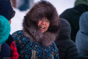 A fan in Nome, AK braves the weather to cheer in Aily Zirkle on March 18, 2020.