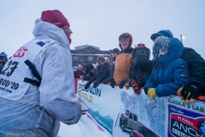 Aily Zirkle greats fans at the Iditarod finish line in Nome, AK on March 18, 2020.