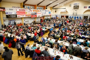A packed house enjoys the Nome Musher's Award Banquet at the city recreation center during the 2017 Iditarod on Sunday March 19, 2017.Photo by Jeff Schultz/SchultzPhoto.com  (C) 2017  ALL RIGHTS RESERVED