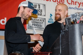 The Nome Kennel Club Fastest Time from Safety to Nome is presented by Rolland Trowbridge, Nome Kennel Club to Nicolas Petit at the Nome Musher's Award Banquet during the 2017 Iditarod on Sunday March 19, 2017.Photo by Jeff Schultz/SchultzPhoto.com  (C) 2017  ALL RIGHTS RESERVED