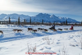 Andrew Nolan passes Jordan Seager as they run down the trail on the Denali Highway during the start day of the 2015 Junior Iditarod on Sunday March 1, 2015(C) Jeff Schultz/SchultzPhoto.com - ALL RIGHTS RESERVED DUPLICATION  PROHIBITED  WITHOUT  PERMISSION