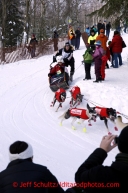 Ed Stielstra makes the corner at Goose Lake during the ceremonial start of the Iditarod sled dog race Anchorage Saturday, March 2, 2013. Photo (C) Jeff Schultz/IditarodPhotos.com  Do not reproduce without permission