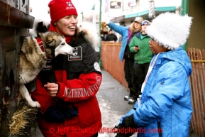 Aliy Zirkle talks to 9 year old Adara Clemons in the staging area prior to the ceremonial start of the Iditarod sled dog race in downtown Anchorage Saturday, March 2, 2013. Photo (C) Jeff Schultz/IditarodPhotos.com  Do not reproduce without permission