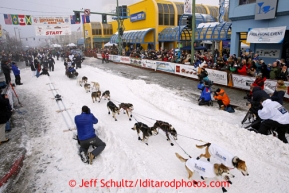 Scott Janssen leaves the ceremonial start line of the Iditarod sled dog race in downtown Anchorage Saturday, March 2, 2013. Photo (C) Jeff Schultz/IditarodPhotos.com  Do not reproduce without permission