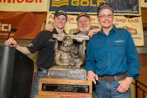 Three generations of the Seavey family, L to R Dallas, Dan and Mitch pose for a photo with the Joe Redington trophy at the musher awards banquet in Nome after the 2016 Iditarod.  Alaska    

Photo by Jeff Schultz (C) 2016  ALL RIGHTS RESERVED