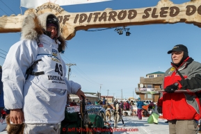 Laura Allaway at the finish line in Nome on Saturday March 21, 2015 during Iditarod 2015.  (C) Jeff Schultz/SchultzPhoto.com - ALL RIGHTS RESERVED DUPLICATION  PROHIBITED  WITHOUT  PERMISSION