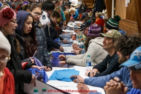 All the musher's who've finished the race as of Saturday March 21st are on hand at the Nome Mini-Convention Center to sign autographs for race fans during Iditarod 2015.  (C) Jeff Schultz/SchultzPhoto.com - ALL RIGHTS RESERVED DUPLICATION  PROHIBITED  WITHOUT  PERMISSION
