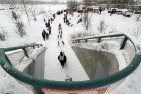 Saturday, March 3, 2012  Aaron Burmeister heads out of a tunnel near the Alaska Native Hospital along Ceremonial Start route of Iditarod 2012 in Anchorage, Alaska.