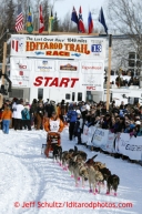 Jake Berkowitz leaves the start line on Willow Lake during the re-start of the Iditarod sled dog race Sunday, March 3, 2013.