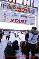 Richie Diehl leaves the start line during the restart on Willow lake during the Iditarod sled dog race Sunday, March 3, 2013.