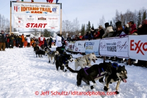 David Sawatzky leaves the start line during the restart on Willow lake during the Iditarod sled dog race Sunday, March 3, 2013.